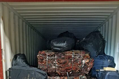 CBP officer conducting cargo inspection at international border crossing