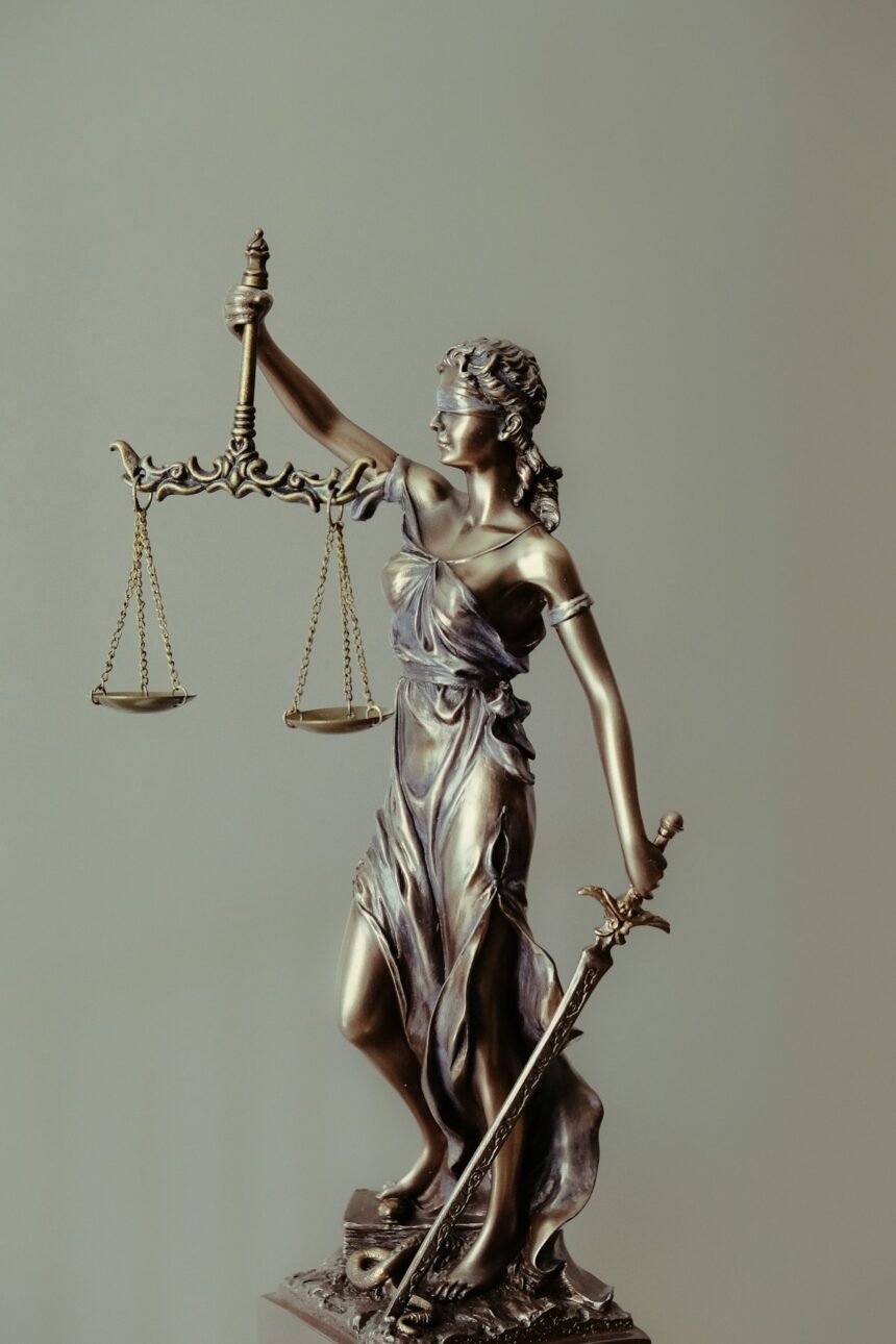 Judicial gavel resting on sounding block in federal appellate courtroom