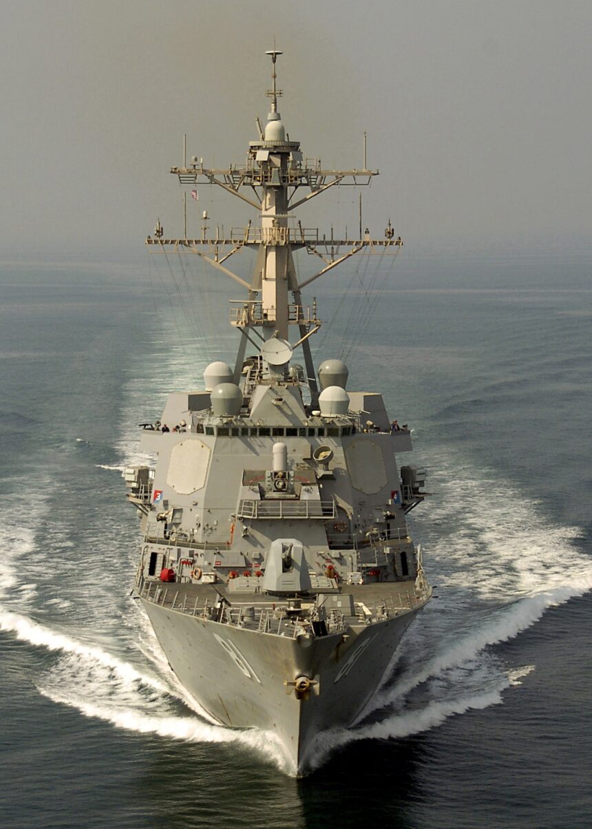 A U.S. Navy Arleigh Burke-class guided-missile destroyer underway conducting maritime security operations in the Persian Gulf.