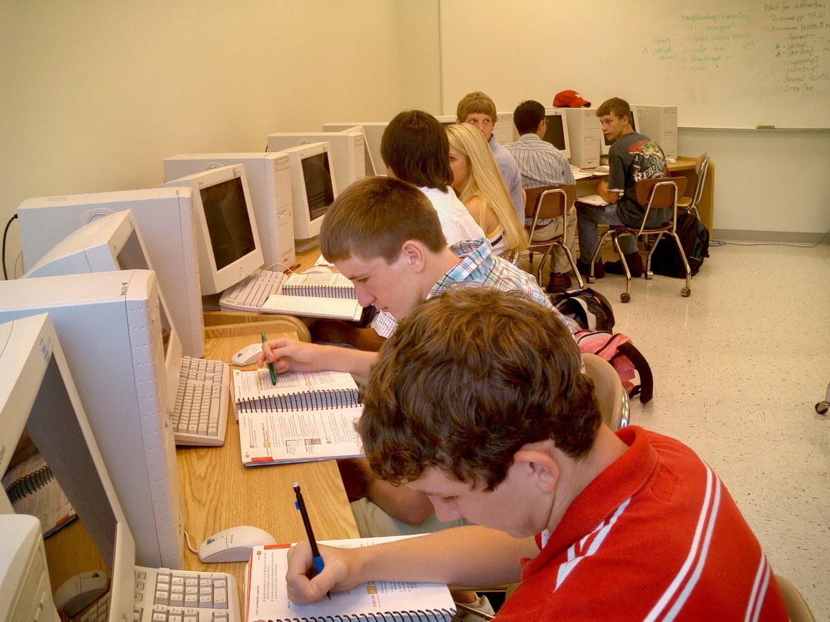 High school students sitting at desks in an American public school classroom