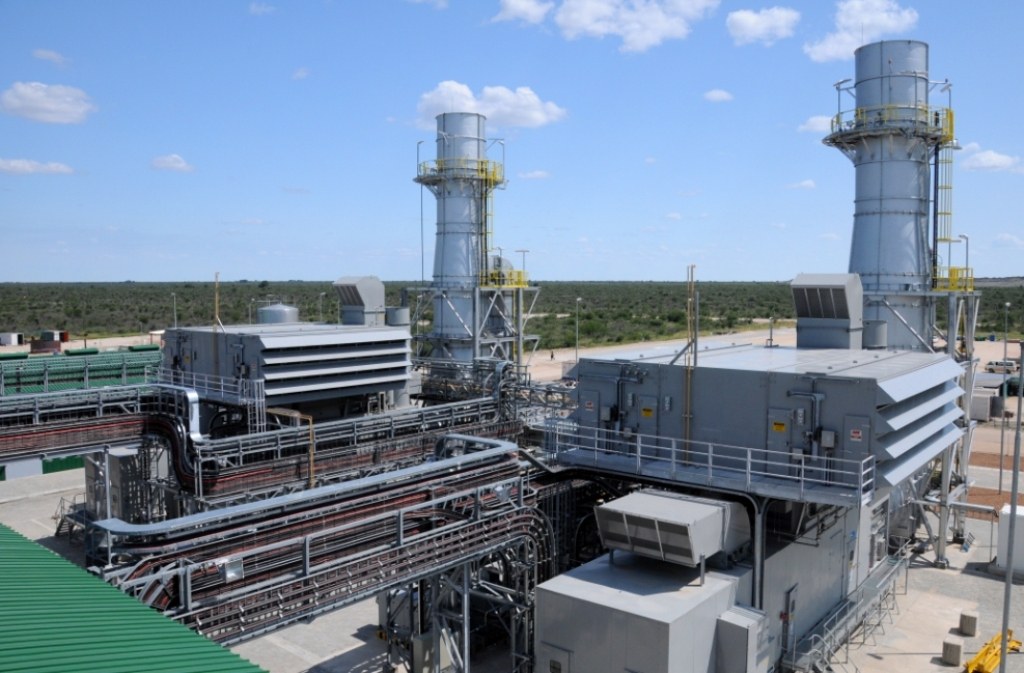 Industrial natural gas turbine power generation facility providing dispatchable electricity