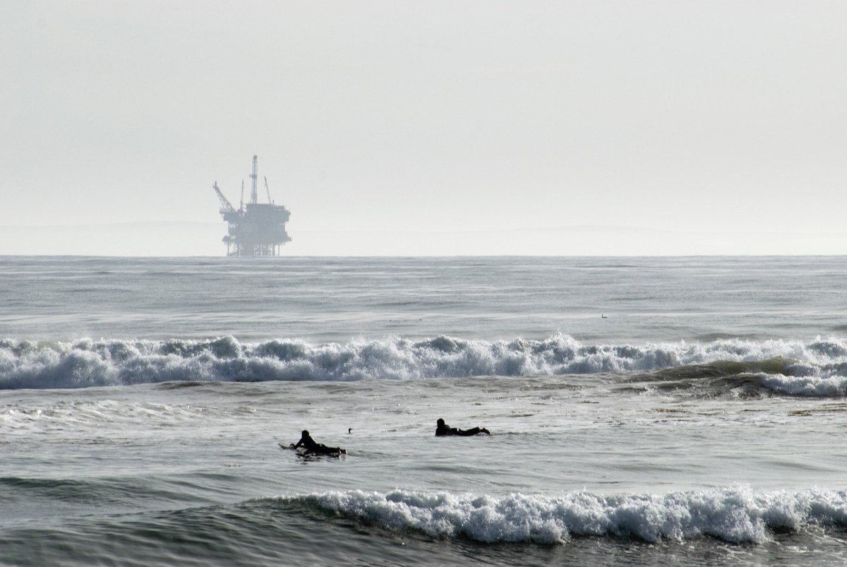 Industrial offshore energy production platform stationed in deep ocean waters
