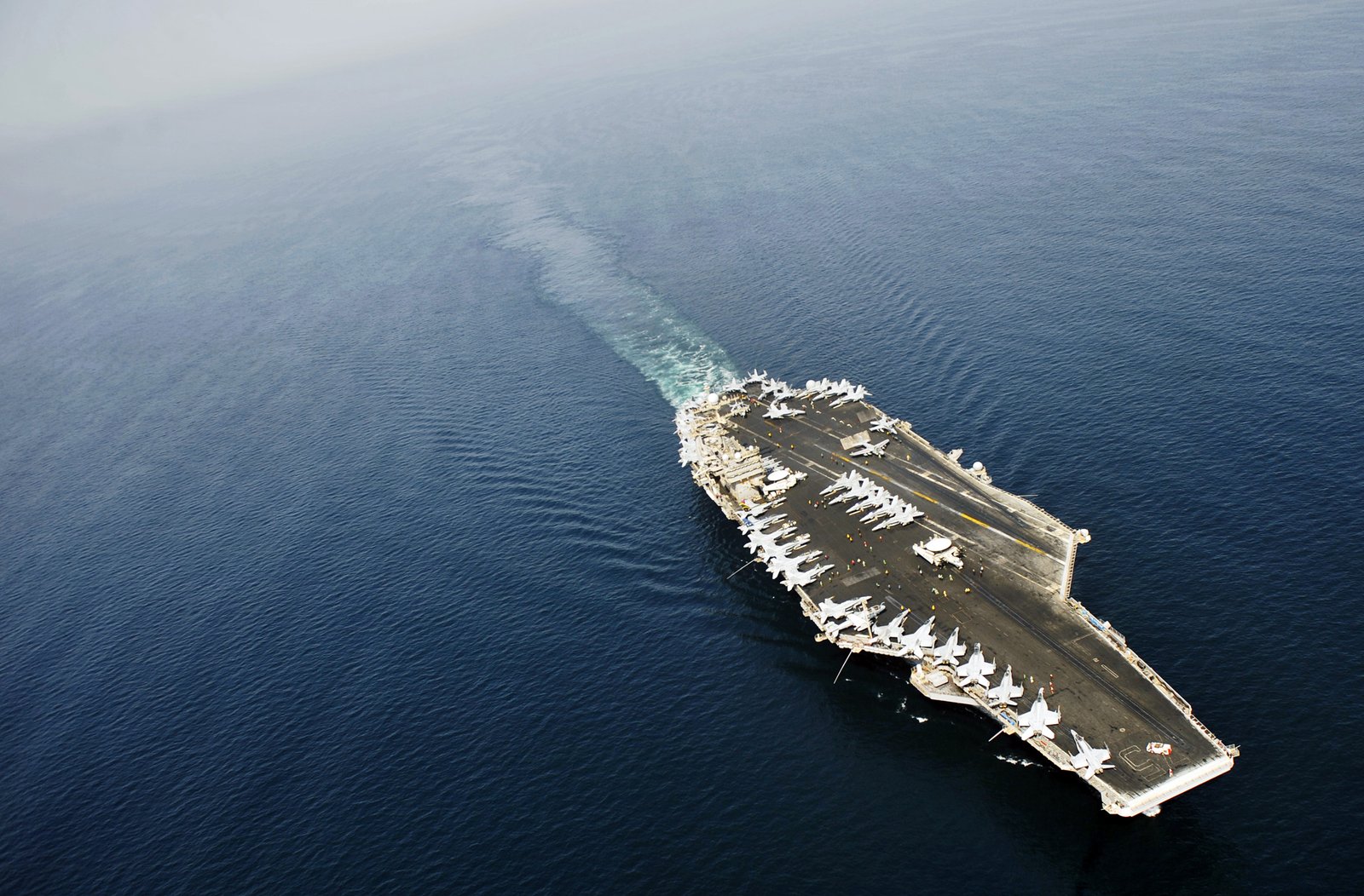 U.S. Navy aircraft carrier flight deck operations in Middle East waters