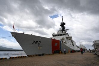 A United States Coast Guard National Security Cutter underway in open ocean waters